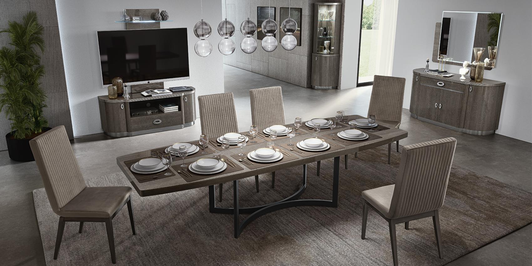 Armonia dining room by Modum - walnut dining table with chrome base and ribbed upholstered chairs
