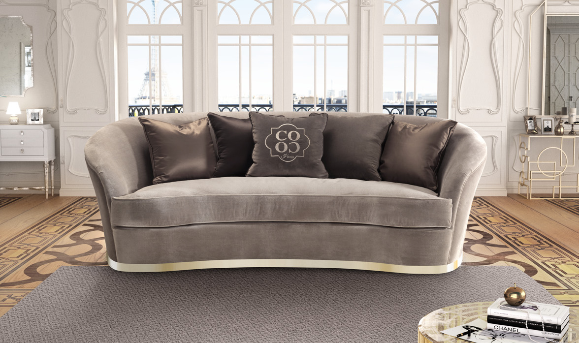 Nora Italian sofa — contemporary curved velvet sofa in a light, uncluttered living room