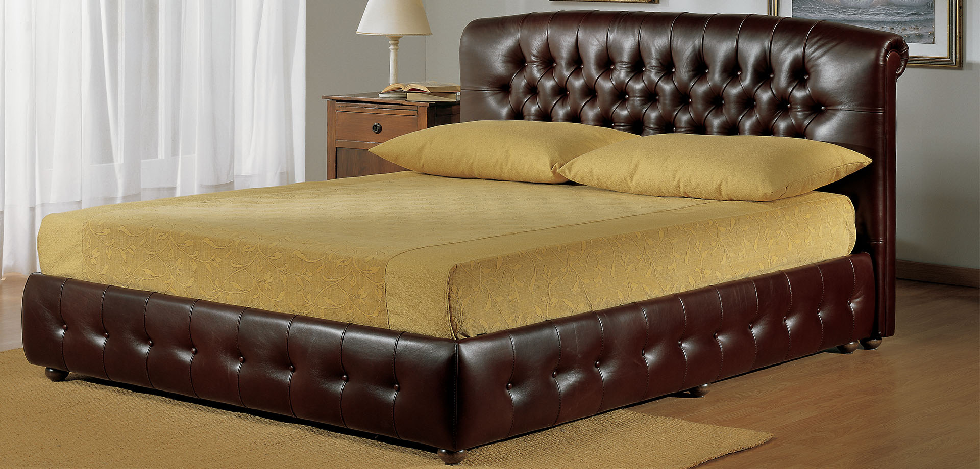 Mistral Italian bed by New Trend Concepts — upholstered headboard shown as the room's focal point