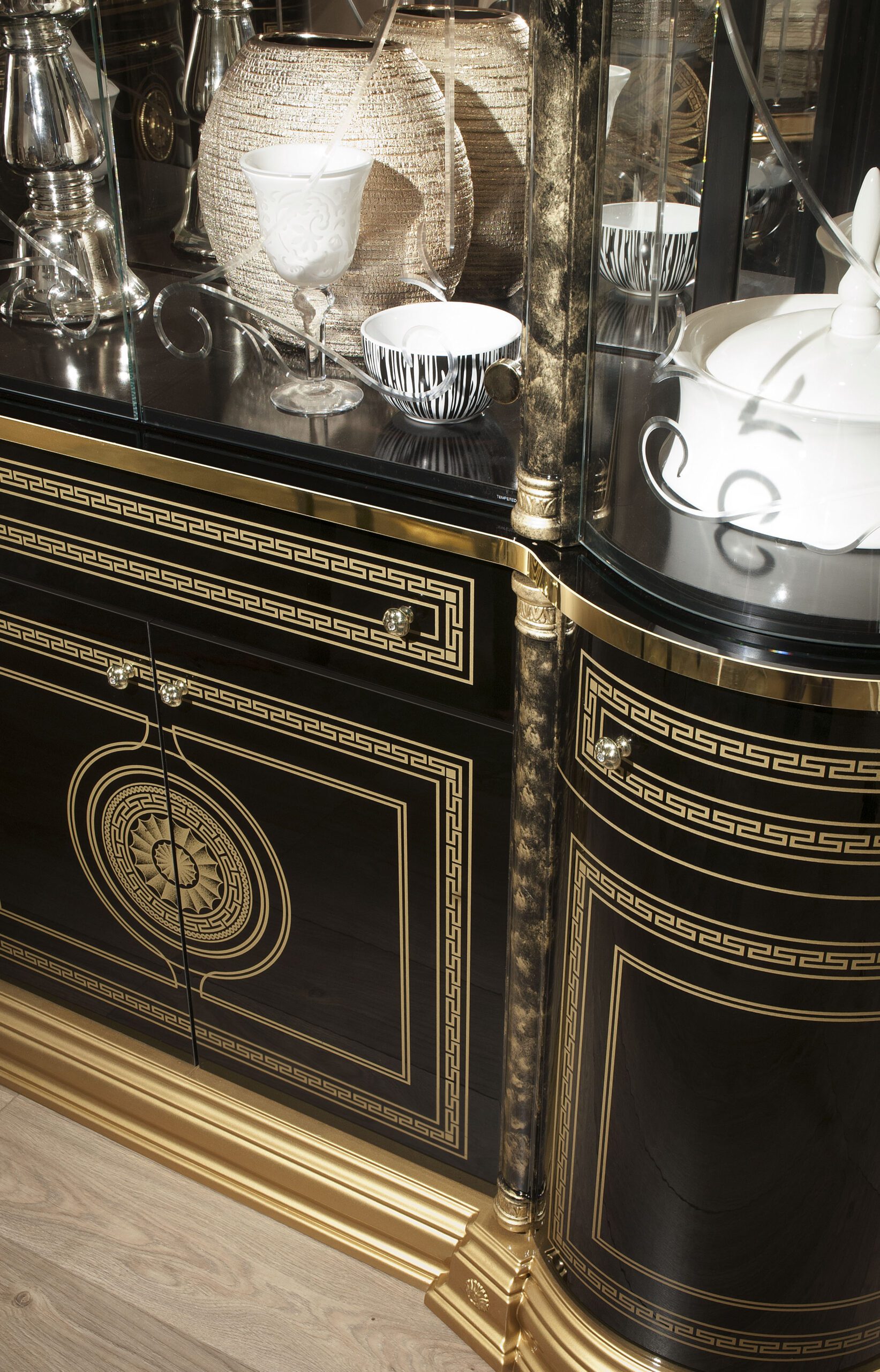 Venus black gold buffet glass cabinet Greek key detail close up
