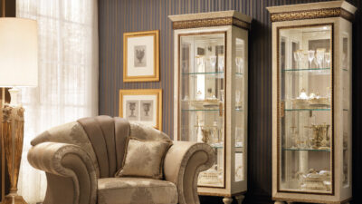 Fantasia Italian living room armchair and display cabinets, crafted by Arredoclassic.