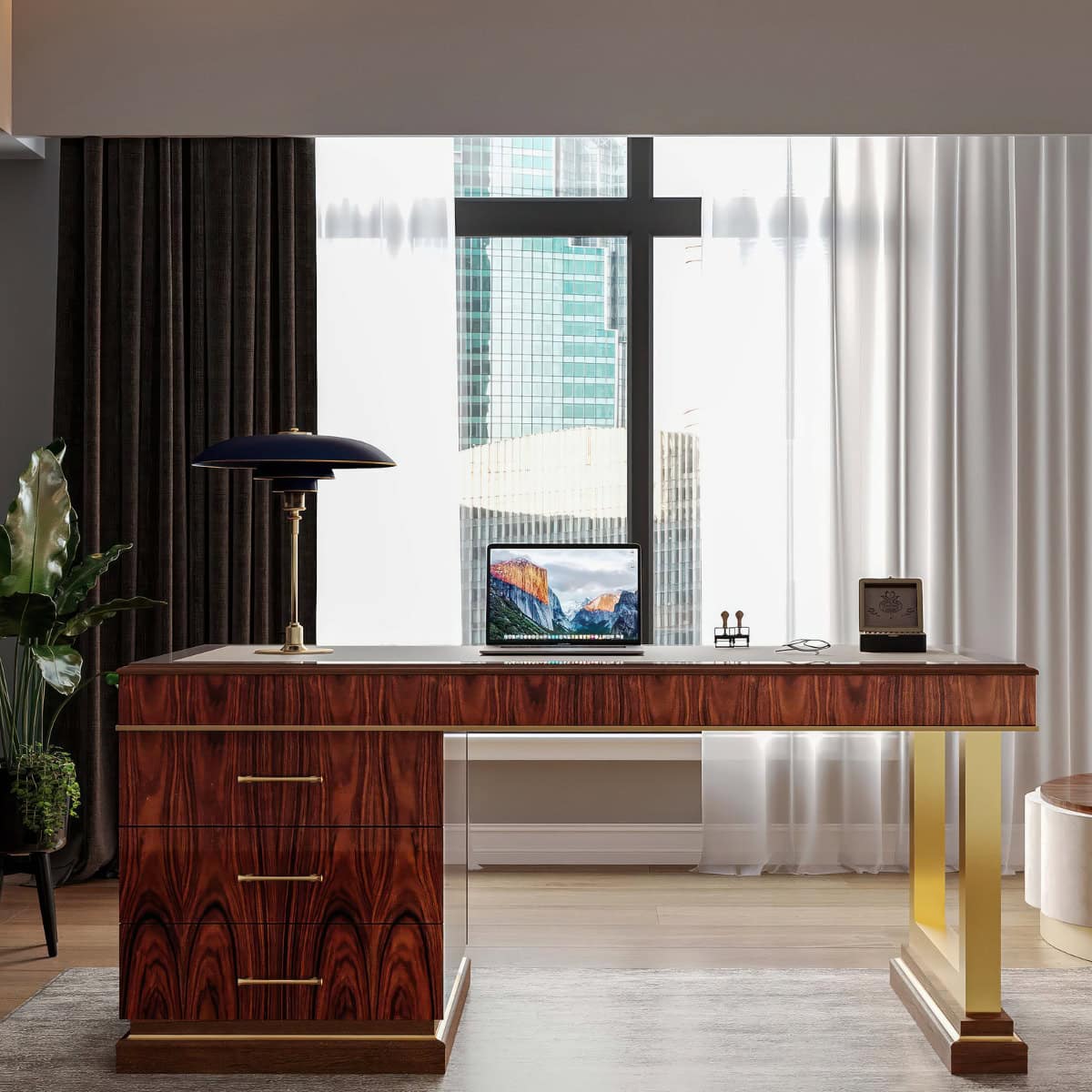 Side angle of The Golden Hour desk set against a city apartment window view.