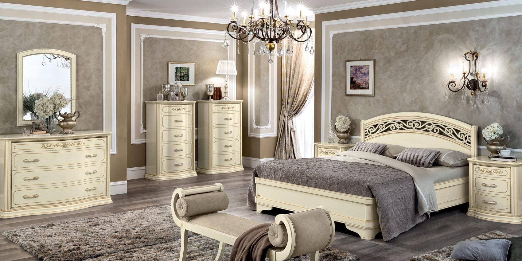 Ivory-lacquer Torriani bedroom suite with carved headboard in a neutral room.